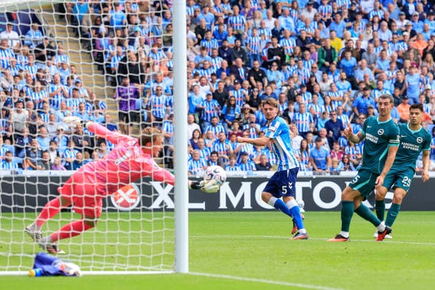 Coventry, England, 13th September 2026. Jack Rudoni of Coventry City shot towards goal is saved by Bart Verbruggen of Brighton and Hove Albion during the Coventry City vs Brighton and Hove Albion Premier League match at the Coventry Building Society Arena, Coventry. Picture credit should read: Cody Froggatt Sportimage EDITORIAL USE ONLY. No use with unauthorised audio, video, data, fixture lists, club league logos or live services. Online in-match use limited to 120 images, no video emulation. No use in betting, games or single club league player publications. SPI_018_CF_COVENTRY_CITY_V_BRIGHTON SPI-4994-0018