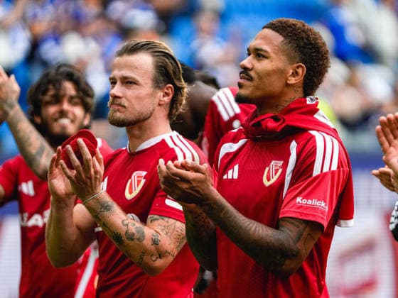 September 13, 2026, xwppx, Soccer 2. Bundesliga, Karlsruher SC vs. Energie Cottbus, Henry Rorig (Energie Cottbus) and Justin Butler (Energie Cottbus) celebrate after the victory. DFL and DFB regulations prohibit any use of photographs as image sequences and or quasi-video. Karlsruhe