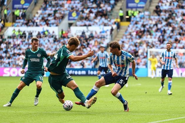 Jack Rudoni of Coventry City battles Coventry City v Brighton and Hove Albion, Premier League, Football, Football, Coventry Building Society Arena, Coventry, UK - 13 Sep 2026Coventry Coventry Building Society Arena United Kingdom EDITORIAL USE ONLY No use with unauthorised audio, video, data, fixture lists, club league logos or live services. Online in-match use limited to 120 images, no video emulation. No use in betting, games or single club league player publications.  Copyright: xMichaelxZemanek Shutterstockx 17144597az
