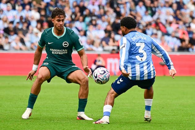 Coventry City v Brighton and Hove Albion, Premier League Brighton and Hove Albion forward Charalampos Kostoulas (19) battles for possession with Coventry City defender Jay Dasilva (3) during the Premier League match between Coventry City and Brighton and Hove Albion at the Coventry Building Society Arena, Coventry, UK on 13 September 2026. Coventry Coventry Building Society Arena West Midlands UK Editorial use only DataCo restrictions apply See www.football-dataco.com , Copyright: xDennisxGoodwinx PSI-24865-0042
