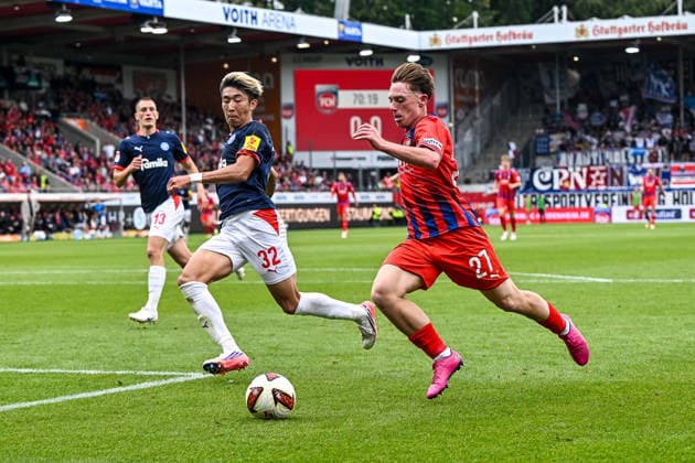 September 13, 2026, GER, Soccer, Men s, 2. Bundesliga, 1. FC Heidenheim vs. Holstein Kiel Hiroki Sekine (Kiel), 32, Michael Heule (Heidenheim), 27 Heidenheim Voith Arena, Baden-Württemberg, Germany Copyright: xNordphotox xHafnerx