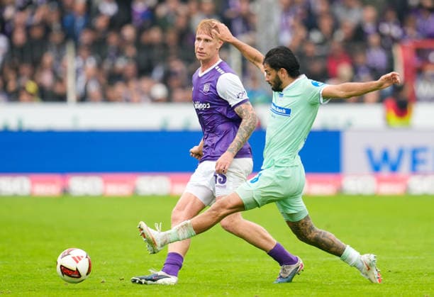 Bjarke Jacobsen (VfL Osnabrück, 15) in a tackle with Kevin Sessa (Hertha BSC, 8), Germany, VfL Osnabrück vs. Hertha BSC, 2. Bundesliga, Matchday 5, 2026–27 season, Bremer Brücke, Osnabrück, September 13, 2026 DFL REGULATIONS PROHIBIT ANY USE OF PHOTOGRAPHS AS IMAGE SEQUENCES AND OR QUASI-VIDEO Photo: HMB Media, Scott W. Coleman Copyright: HMBxMedia xScottxW.xColeman