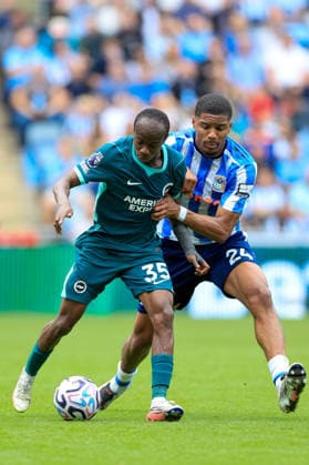 Coventry City v Brighton & and Hove Albion - Premier League 2026 27 Malick Yalcouye of Brighton and Hove Albion and Aurele Florian Amenda of Coventry City challenge during the Premier League 2026 27 match between Coventry City and Brighton & Hove Albion at The Coventry Building Society Arena on September 13, 2026 in Coventry, England. WARNING! This Photograph May Only Be Used For Newspaper And Or Magazine Editorial Purposes. May Not Be Used For Publications Involving 1 player, 1 Club Or 1 Competition Without Written Authorisation From Football DataCo Ltd. For Any Queries, Please Contact Football DataCo Ltd on +44 (0) 207 864 9121 Coventry The Coventry Building Society Arena England United Kingdom Copyright: xAllstarxPicturexLibraryxLtdx