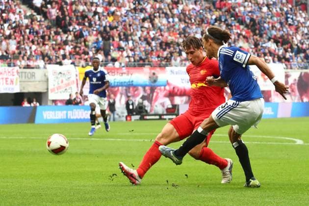 RB Leipzig vs. Hamburger SV, Bundesliga, Leipzig, September 13, 2026, Red Bull Arena, Soccer, Men, 2026–2027 Season, Bundesliga 1, Matchday 3, RB Leipzig vs. Hamburger SV, Pictured from left: Willi Orban (4), RB Leipzig, and Yussuf Poulsen (15), HSV,