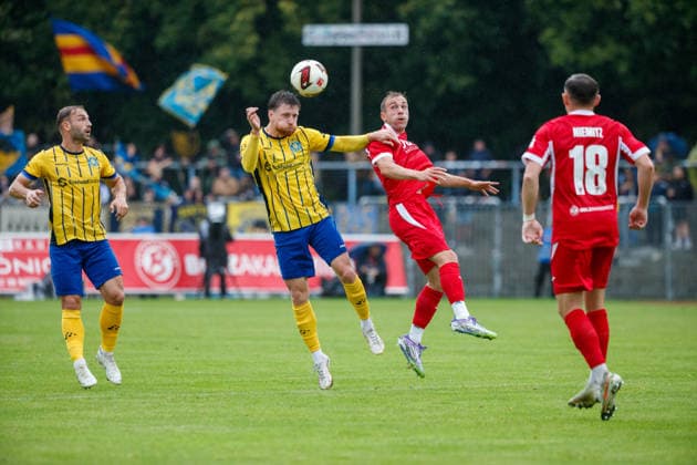 Left: Dorian Cevis (Lok) vs. Kay Seidemann (Greifswald, GER), Greifswalder FC vs. 1. FC Lok Leipzig, Soccer, Men, Northeast Regional League, Matchday 8, 2026–2027 Season, September 13, 2026, Greifswald Volksstadion, Mecklenburg-Western Pomerania, Germany