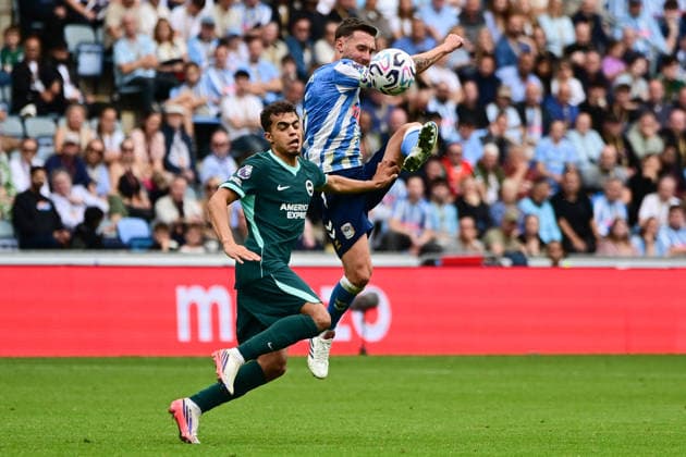 Coventry City v Brighton and Hove Albion, Premier League Coventry City midfielder Matt Grimes (6) gets up high under pressure from Brighton and Hove Albion midfielder Yasin Ayari (26) during the Premier League match between Coventry City and Brighton and Hove Albion at the Coventry Building Society Arena, Coventry, UK on 13 September 2026. Coventry Coventry Building Society Arena West Midlands UK Editorial use only DataCo restrictions apply See www.football-dataco.com , Copyright: xDennisxGoodwinx PSI-24865-0052