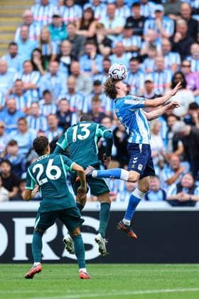 Jack Rudoni of Coventry City battles with for possession in the air Coventry City v Brighton and Hove Albion, Premier League, Football, Football, Coventry Building Society Arena, Coventry, UK - 13 Sep 2026Coventry Coventry Building Society Arena United Kingdom EDITORIAL USE ONLY No use with unauthorised audio, video, data, fixture lists, club league logos or live services. Online in-match use limited to 120 images, no video emulation. No use in betting, games or single club league player publications.  Copyright: xMichaelxZemanek Shutterstockx 17144597br