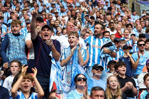 Coventry City fans enjoy the atmosphere Coventry City v Brighton and Hove Albion, Premier League, Football, Football, Coventry Building Society Arena, Coventry, UK - 13 Sep 2026Coventry Coventry Building Society Arena United Kingdom EDITORIAL USE ONLY No use with unauthorised audio, video, data, fixture lists, club league logos or live services. Online in-match use limited to 120 images, no video emulation. No use in betting, games or single club league player publications.  Copyright: xMichaelxZemanek Shutterstockx 17144597bm