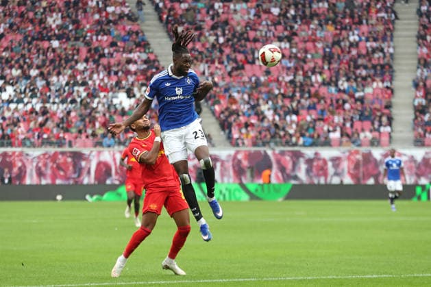 1 Bundesliga: RB Leipzig vs. Hamburger SV, September 13, 2026; Jordan Torunarigha (23), Hamburger SV, scores with a header past Christopher Nkunku (28), RB Leipzig in possession. LEIPZIG, GERMANY SEPTEMBER 13 Bundesliga match between RB Leipzig and Hamburger SV at the Red Bull Arena on Matchday 3 of the Bundesliga on September 13, 2026 in Leipzig, Germany. DFL regulations prohibit any use of photographs as image sequences and or quasi-video. Copyright: xBEAUTIFULxSPORTS JanxKaeferx