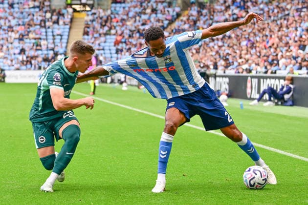Coventry City v Brighton and Hove Albion, Premier League Brighton and Hove Albion defender Joao Costinha (20) gets to grips with Coventry City defender Ethan Pinnock (2) during the Premier League match between Coventry City and Brighton and Hove Albion at the Coventry Building Society Arena, Coventry, UK on 13 September 2026. Coventry Coventry Building Society Arena West Midlands UK Editorial use only DataCo restrictions apply See www.football-dataco.com , Copyright: xDennisxGoodwinx PSI-24865-0058