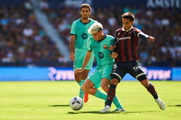 Pedri Gonzalez of FC Barcelona and Hugo Sotelo of Levante UD during the LaLiga EA Sports match between Levante UD and FC Barcelona at Estadi Ciutat de Valencia on September 13, 2026, in Valencia, Spain