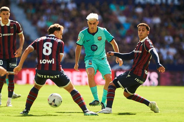Pedri Gonzalez of FC Barcelona and Hugo Sotelo of Levante UD during the LaLiga EA Sports match between Levante UD and FC Barcelona at Estadi Ciutat de Valencia on September 13, 2026, in Valencia, Spain