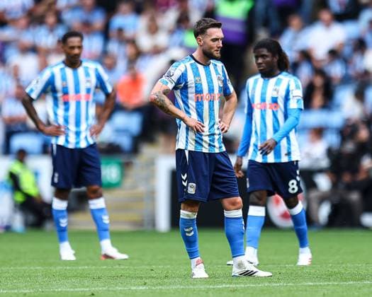Coventry City players show a look of dejection Coventry City v Brighton and Hove Albion, Premier League, Football, Football, Coventry Building Society Arena, Coventry, UK - 13 Sep 2026Coventry Coventry Building Society Arena United Kingdom EDITORIAL USE ONLY No use with unauthorised audio, video, data, fixture lists, club league logos or live services. Online in-match use limited to 120 images, no video emulation. No use in betting, games or single club league player publications.  Copyright: xMichaelxZemanek Shutterstockx 17144597bw