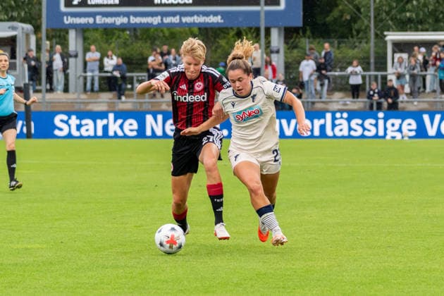 Game action, tackle, from left: Paulina Krumbiegel (Eintracht Frankfurt), 27, Laia Martret (TSG 1899 Hoffenheim), 21, GER, Eintracht Frankfurt vs. TSG 1899 Hoffenheim, soccer, Google Pixel Women’s Bundesliga, Matchday 4, 2026–2027 season, September 13, 2026, DFB regulations prohibit any use of photographs as image sequences and or quasi-video, GER, Eintracht Frankfurt vs. TSG 1899 Hoffenheim, Soccer, Google Pixel Women’s Bundesliga, Matchday 4, 2026–2027 Season, September 13, 2026, Frankfurt am Main Copyright: xEibner-Pressefoto J-NxGroemlingx EP_JGG
