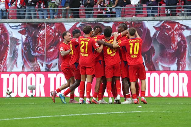 1 German Bundesliga: RB Leipzig vs. Hamburger SV, September 13, 2026—Goal celebration by the RB Leipzig team. LEIPZIG, GERMANY—SEPTEMBER 13—Bundesliga match between RB Leipzig and Hamburger SV at the Red Bull Arena on Matchday 3 of the 1. Bundesliga on September 13, 2026 in Leipzig, Germany. DFL regulations prohibit any use of photographs as image sequences and or quasi-video. Copyright: xBEAUTIFULxSPORTS JanxKaeferx