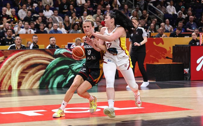 Leonie Fiebich with the ball, Megan Gustafson in a duel; game scene; action; sports; basketball; FIBA World Cup; Women s World Championship; 3rd-place game; 2026–2027 season; September 13, 2026; DBB; Germany (GER) vs. Spain (ESP)