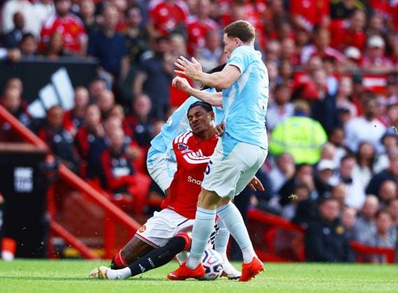 Marcus Rashford of Manchester United, ManU collides with Elliot Anderson of Manchester City Manchester United v Manchester City, Premier League, Football, Football, Old Trafford, Manchester, UK - 13 Sep 2026Manchester Old Trafford United Kingdom EDITORIAL USE ONLY No use with unauthorised audio, video, data, fixture lists, club league logos or live services. Online in-match use limited to 120 images, no video emulation. No use in betting, games or single club league player publications. Copyright: xMattxWest Shutterstockx 17144604aa