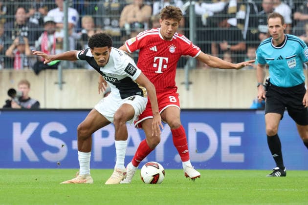 September 13, 2026, xrekx, Soccer, Bundesliga 1, SV Elversberg vs. FC Bayern Munich, Francis Onyeka, SV 07 Elversberg, Tom Bischof, FC Bayern Munich, tackle, Action, battle for the ball. DFL and DFB regulations prohibit any use of photographs as image sequences and or quasi-video. Elversberg