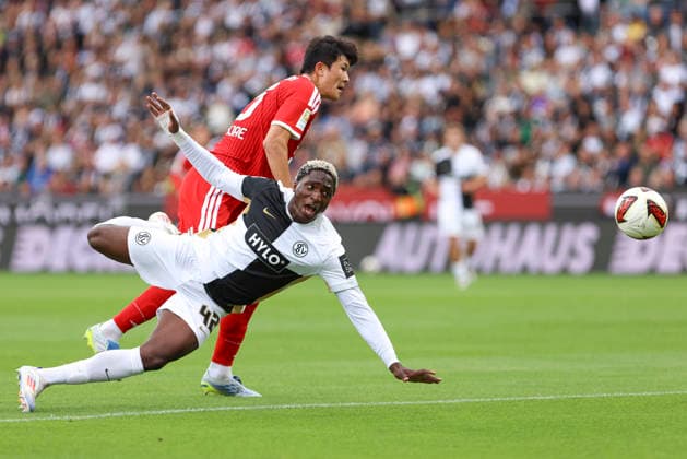 David Mokwa of SV 07 Elversberg and Min Jae Kim of FC Bayern Munich battle for the ball during the Bundesliga 1 match between SV Elversberg and FC Bayern Munich at the Ursapharm Arena on September 13, 2026, in Spiesen-Elversberg, Germany. Photo by Oliver Kaelke, DeFodi Images. David Mokwa of SV 07 Elversberg and Min Jae Kim of FC Bayern Munich battle for the ball during the Bundesliga match between SV Elversberg and FC Bayern Munich at Ursapharm Arena on September 13, 2026 in Spiesen-Elversberg, Germany. Photo by Oliver Kaelke, DeFodi Images. DFB and DFL regulations prohibit any use of photographs as image sequences and or quasi-video. Photo by Oliver Kaelke, DeFodi Images.