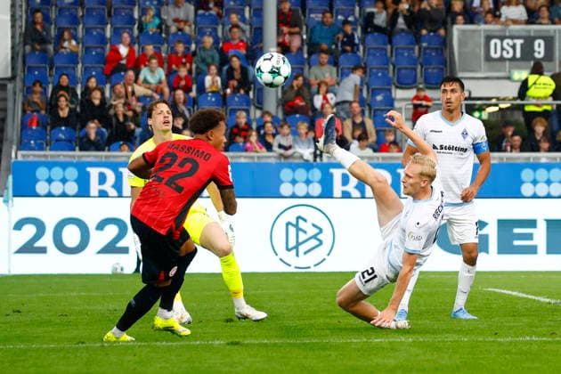 September 13, 2026, xavx, Soccer 3rd Division, SV Wehen Wiesbaden vs. SV Waldhof Mannheim; Roberto Massimo (SV Wehen Wiesbaden), Julian Rieckmann (SV Waldhof Mannheim) clears the ball; Wiesbaden