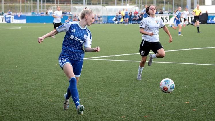 Women s Regional League soccer match between FC Schalke 04 and Fortuna Freudenberg on artificial turf field 6 at the Schalke 04 sports complex in Gelsenkirchen ** FOR EDITORIAL PURPOSES ONLY ** EDITORIAL USE ONLY ** p Jolina Opladen 21 of FC Schalke wearing a blue jersey and Fortuna Freudenberg wearing a white jersey during the women’s regional league soccer match between FC Schalke 04 and Fortuna Freudenberg on Sunday, September 13, 2026, on artificial turf field 6 at the Schalke 04 sports complex in Gelsenkirchen. Photo by Frank Oppitz, FUNKE Photo Services. p Sports, Germany, North Rhine-Westphalia, Gelsenkirchen. Copyright FrankxOppitz Copyright: FrankxOppitz doc87l3lte4a1vklck2fix ,EDITORIAL USE ONLY Copyright: FrankxOppitz