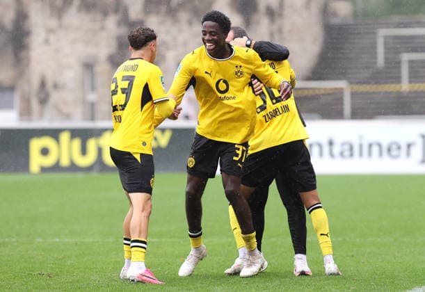 Sunday, September 13, 2026, 2026–27 season, Regionalliga West, Matchday 8 at Rote Erde Stadium in Dortmund, BVB Borussia Dortmund II vs. SV Rödinghausen, Dortmund celebrates the 3–2 goal: Malik Hodroj (BVB II), Nanitonda Mayivanga Quiala (BVB II), and Fadi Zarqelain (BVB II), from left to right