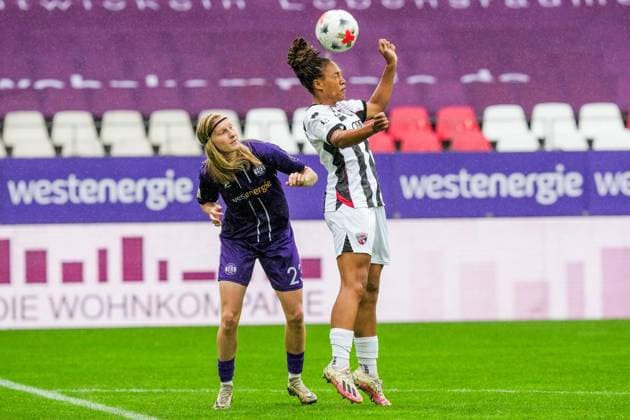 Women s Soccer in Essen ** FOR EDITORIAL PURPOSES ONLY ** EDITORIAL USE ONLY ** p Kyra Spitzner of SGS Essen in a match against Melissa Kuya Strobel of Ingolstadt. The match between SGS Essen and FC Ingolstadt 04 ended in a 1–1 draw on September 13, 2026, at the Essen Stadium at Hafenstraße 97a. Michael Gohl, FUNKE Photo Services p Sports Germany North Rhine-Westphalia, Essen Copyright MichaelxGohl Copyright: MichaelxGohl doc87l3xuwkl1wsgolgf2x ,EDITORIAL USE ONLY Copyright: MichaelxGohl
