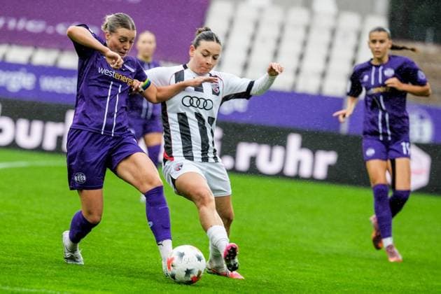 Women s Soccer in Essen ** FOR EDITORIAL PURPOSES ONLY ** EDITORIAL USE ONLY ** p Anja Heuschkel of SGS Essen in a match against Paula Vidovic of Ingolstadt. The match between SGS Essen and FC Ingolstadt 04 ended in a 1–1 draw on September 13, 2026, at the Essen Stadium at Hafenstraße 97a. Michael Gohl, FUNKE Photo Services p Sport Germany NorthRhineland-Westphalia, Essen Copyright MichaelxGohl Copyright: MichaelxGohl doc87l3xtrm98yt06hlv0o ,EDITORIAL USE ONLY Copyright: MichaelxGohl