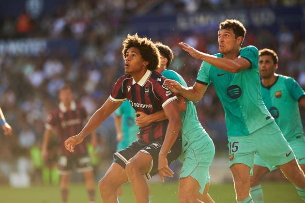 Ifeanyi Ndukwe of Levante UD and Christensen of FC Barcelona during the LaLiga EA Sports match between Levante UD and FC Barcelona at Estadi Ciutat de Valencia on September 13, 2026, in Valencia, Spain