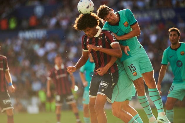 Ifeanyi Ndukwe of Levante UD and Christensen of FC Barcelona during the LaLiga EA Sports match between Levante UD and FC Barcelona at Estadi Ciutat de Valencia on September 13, 2026, in Valencia, Spain