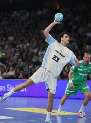 GER HBL Season 2026–2027: Füchse Berlin vs. VfL Gummersbach, September 13, 2026, MAX SCHMELING HALLE, Berlin, NIKOLA ROGANOVIC (Füchse Berlin 23) shows a knack for scoring from the 7-meter line with a lob shot