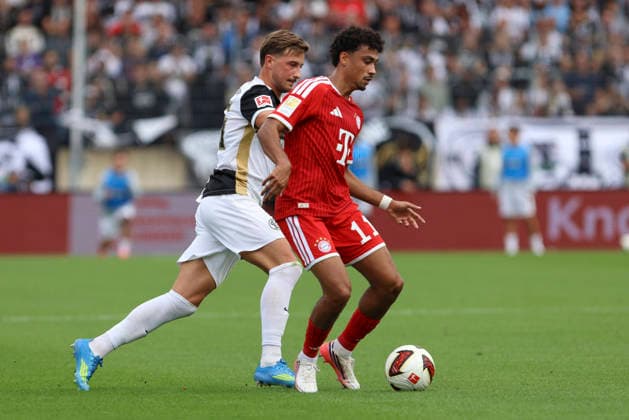 Lukas Petkov of SV 07 Elversberg and Nathaniel Brown of FC Bayern Munich battle for the ball during the Bundesliga 1 match between SV Elversberg and FC Bayern Munich at the Ursapharm Arena on September 13, 2026, in Spiesen-Elversberg, Germany Photo by Oliver Kaelke DeFodi Images Lukas Petkov of SV 07 Elversberg and Nathaniel Brown of FC Bayern Munich battle for the ball during the Bundesliga match between SV Elversberg and FC Bayern Munich at Ursapharm Arena on September 13, 2026 in Spiesen-Elversberg, Germany. Photo by Oliver Kaelke, DeFodi Images. DFB and DFL regulations prohibit any use of photographs as image sequences and or quasi-video. Photo by Oliver Kaelke, DeFodi Images.