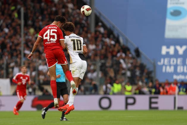Aleksander Pavlovic of FC Bayern Munich and Noah Darvich of SV 07 Elversberg battle for the ball during the 1. Bundesliga match between SV Elversberg and FC Bayern Munich at the Ursapharm Arena on September 13, 2026, in Spiesen-Elversberg, Germany. Photo by Oliver Kaelke, DeFodi Images. Aleksander Pavlovic of FC Bayern Munich and Noah Darvich of SV 07 Elversberg battle for the ball during the Bundesliga match between SV Elversberg and FC Bayern Munich at the Ursapharm Arena on September 13, 2026 in Spiesen-Elversberg, Germany. Photo by Oliver Kaelke, DeFodi Images. DFB and DFL regulations prohibit any use of photographs as image sequences and or quasi-video. Photo by Oliver Kaelke, DeFodi Images.
