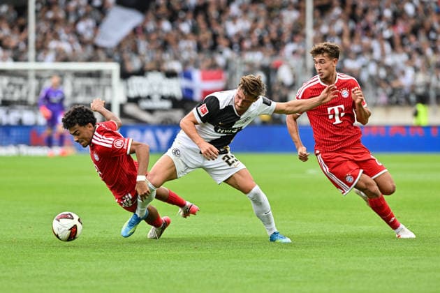1 German Bundesliga: SV Elversberg vs. FC Bayern Munich, September 13, 2026, ELVERSBERG, GERMANY, September 13: Nathaniel BROWN (FC Bayern Munich, No. 11) and Lukas PETKOV (SV Elversberg, No. 25) face off during the Bundesliga match between SV Elversberg and FC Bayern Munich on Matchday 3 at the Ursapharm Arena on Kaiserlinde. DFL REGULATIONS PROPROHIBIT ANY USE OF PHOTOGRAPHS AS IMAGE SEQUENCES AND OR QUASI-VIDEO Copyright: xBEAUTIFULxSPORTS Goldbergx