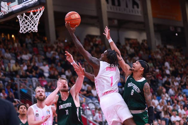 John Michael Wright of Bonn takes the ball against Mitchell Puttkammer of Nanterre and Benjamin Sene of Nanterre, Bonn, Germany, September 13, 2026, basketball, exhibition game, Telekom Baskets Bonn vs. Nanterre 92