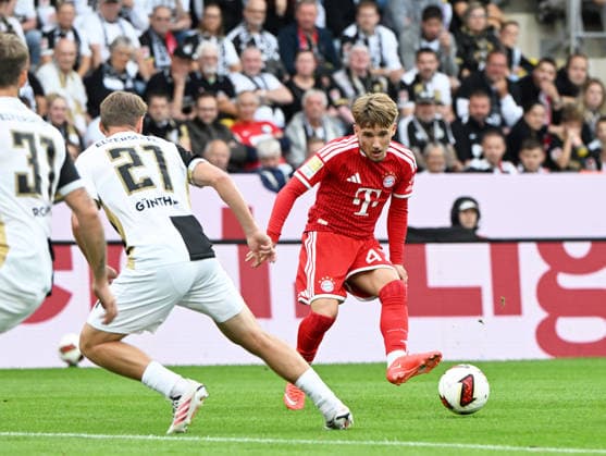 German Bundesliga 2026-27 Season, September 13, 2025, Ursapharm Arena: SV Elversberg (ELV) vs. FC Bayern Munich (FCB); Lasse GUENTHER (SV Elversberg), Lennart KARL (FC Bayern Munich); German Bundesliga: SV Elversberg