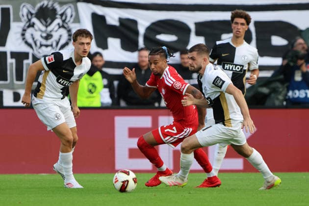 September 13, 2026, Soccer, Men s, Bundesliga 1, 2026–2027 Season, SV 07 Elversberg vs. FC Bayern Munich, Maurice Krattenmacher (SV 07 Elversberg), Lukasz Poreba (SV 07 Elversberg), Michael Olise (FC Bayern Munich), Ursapharm Arena at the Kaiserlinde, Elversberg, Saarland, Germany (DEU) Copyright: xFabianxKleerx