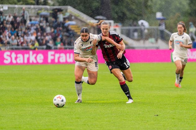 Game scene, tackle, ball action, action, ball, dribbling, from left: Svenja Foelmli (TSG 1899 Hoffenheim), 19; Marthine Ostenstad (Eintracht Frankfurt), 14; GER, Eintracht Frankfurt vs. TSG 1899 Hoffenheim, soccer, Google Pixel Women’s Bundesliga, Matchday 4, 2026–2027 season, September 13, 2026, DFB regulations prohibit any use of photographs as image sequences and or quasi-video, GER, Eintracht Frankfurt vs. TSG 1899 Hoffenheim, Soccer, Google Pixel Women’s Bundesliga, Matchday 4, 2026–2027 Season, September 13, 2026, Frankfurt am Main Copyright: xEibner-Pressefoto J-NxGroemlingx EP_JGG