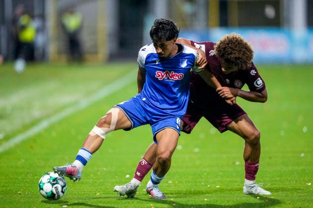 v li Yasin Zor TSG II, 10, Neo Telle Cologne, 31, tackle, game scene, duel, tackle, tackling, dynamics, action, 13 09 2026, Sinsheim, Germany, soccer, 3rd Division, TSG 1899 Hoffenheim II vs. SC Fortuna Cologne, DFB and DFL regulations prohibit any use of photographs as image sequences and or quasi-video xozx