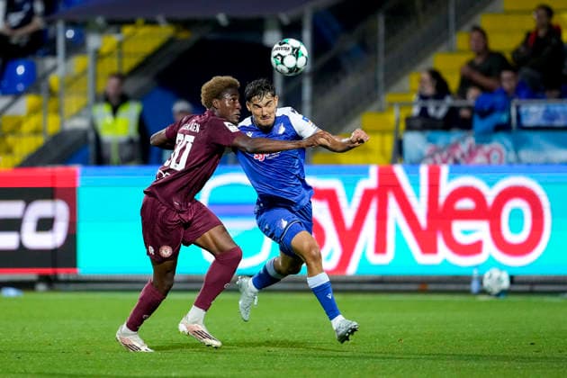 From left: Romeo Aigbekaen (Cologne), 30; Sean Dulic (TSG II), 3; tackle, game scene, duel, tackle, tackling, dynamism, action, 13 September 2026, Sinsheim, Germany, soccer, 3rd Division, TSG 1899 Hoffenheim II vs. SC Fortuna Cologne, DFB and DFL regulations prohibit any use of photographs as image sequences and or quasi-video xozx
