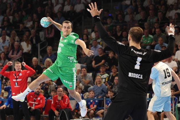 September 13, 2026, xBHAx, Handball, Opel HBL, 2026–2027 Season, 1 HBL, Füchse Berlin vs. VfL Gummersbach, Max Schmeling Halle: Tim Freihöfer of Füchse Berlin (No. 20) on the attack against Ignacio Biosca of VfL Gummersbach (No. 1), Berlin, Germany