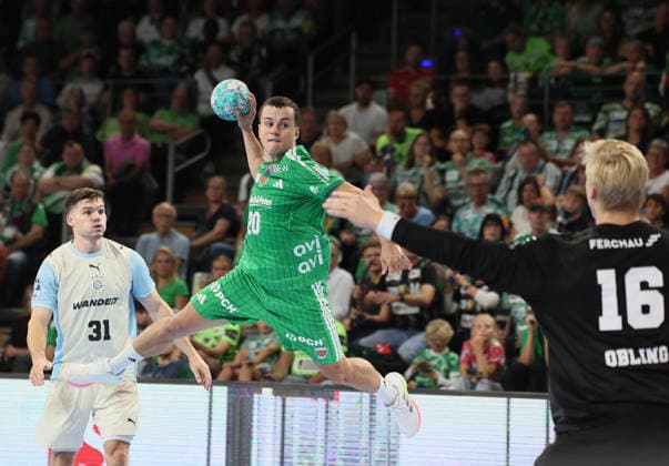 GER HBL 2026–2027 Season: Füchse Berlin vs. VfL Gummersbach, September 13, 2026, MAX SCHMELING HALLE, Berlin; Tim FREIHÖFER of Füchse Berlin (No. 20) shoots from outside against Bertram OBLING of VfL Gummersbach (No. 16)