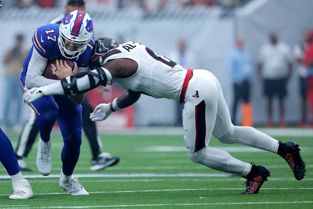 September 13, 2026, Houston, Texas, U.S: Buffalo Bills quarterback Josh Allen (17) is tackled by Houston Texans linebacker Azeez al-Shaair (0) while carrying the ball during the first quarter of the NFL, American Football Herren, USA regular season game between the Houston Texans and the Buffalo Bills at Reliant Stadium in Houston, TX on September 13, 2026. Houston U.S - ZUMAw137 20260913_aap_w137_038 Copyright: xErikxWilliamsx