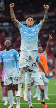 Manchester United, ManU FC v Manchester City FC - Premier League - Season 2026 2027 - Matchday 4 - Old Trafford Manchester City™s Enzo Fernandez celebrates win at end of the game during the Manchester United v Manchester City Premier League match at Old Trafford , Manchester , Season 26 27, 13 September 2026 EDITORIAL USE ONLY. No use with unauthorized audio, video, data, fixture lists, club league logos or live services. Online in-match use limited to 45 images, no video emulation. No use in betting, games or single club league player publications Manchester United Kingdom