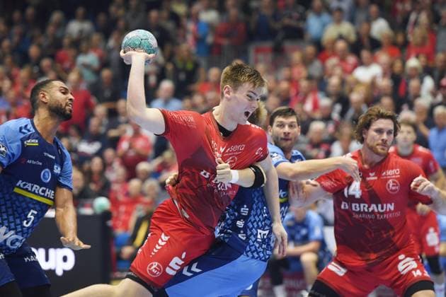 Reynir Thor Stefansson (MT Melsungen 19) on the ball, Philipp Ahouansou (TVB Stuttgart 5 L), Johannes Golla (MT Melsungen 14 R), GER, MT Melsungen vs. TVB 1898 Stuttgart, Handball, Bundesliga 1, Matchday 4, 2026–2027 Season, September 13, 2026, GER, MT Melsungen vs. TVB Stuttgart, Handball, 1st Bundesliga, Matchday 4, 2026–2027 Season, September 13, 2026, Kassel Copyright: xEibner-Pressefotox xRolandxSippelx EP_RSL