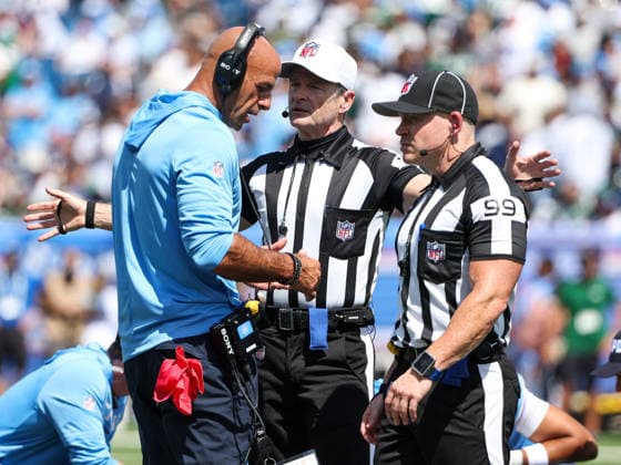 Sep 13, 2026; Nashville, TN, USA; Tennessee Titans head coach Robert Saleh talks with game referee Land Clark regarding why a flag was not thrown for a hit after a fair catch was called during the NFL, American Football Herren, USA regular season game between the New York Jets and Tennessee Titans at Nissan Stadium. Mandatory Credit: -Cal Media NFL 2026: Jets Vs Titans SEP 13  - ZUMAc04_ 20260913_zma_c04_047 Copyright: xStephenxFurstx