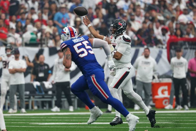 HOUSTON, TX - SEPTEMBER 13: Quarterback C.J. Stroud 7 of the Houston Texans passes the ball as he is pursed by defensive end Michael Hoecht 55 of the Buffalo Bills during the NFL, American Football Herren, USA game between the Houston Texans and the Buffalo Bills on September 13, 2026, at Reliant Stadium in Houston, TX.(Photo by David Buono Icon Sportswire) NFL: SEP 13 Bills at Texans EDITORIAL USE ONLY Icon260913006