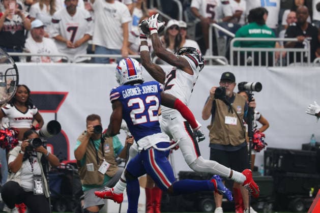 HOUSTON, TX - SEPTEMBER 13: Wide receiver Nico Collins 12 of the Houston Texans catches a long pass while being defended by safety C.J. Gardner-Johnson 22 of the Buffalo Bills during the NFL, American Football Herren, USA game between the Houston Texans and the Buffalo Bills on September 13, 2026, at Reliant Stadium in Houston, TX.(Photo by David Buono Icon Sportswire) NFL: SEP 13 Bills at Texans EDITORIAL USE ONLY Icon260913007