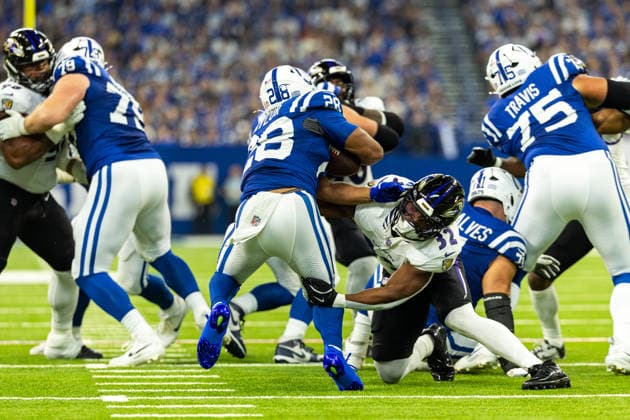 Sep 13, 2026; Indianapolis, IN, USA; Baltimore Ravens linebacker Trenton Simpson (32) makes the tackle on Indianapolis Colts running back Jonathan Taylor (28) during NFL, American Football Herren, USA game action at Lucas Oil Stadium. Mandatory Credit: -Cal Media NFL 2026: Ravens Vs Colts SEP 13  - ZUMAc04_ 20260913_zma_c04_123 Copyright: xJohnxMersitsx