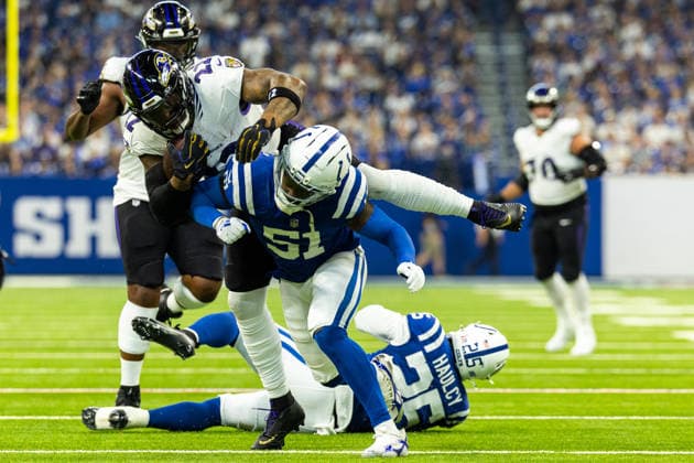Sep 13, 2026; Indianapolis, IN, USA; Baltimore Ravens running back Derrick Henry (22) runs with the ball as Indianapolis Colts linebacker Akeem Davis-Gaither (51) pursues during NFL, American Football Herren, USA game action at Lucas Oil Stadium. Mandatory Credit: -Cal Media NFL 2026: Ravens Vs Colts SEP 13  - ZUMAc04_ 20260913_zma_c04_134 Copyright: xJohnxMersitsx